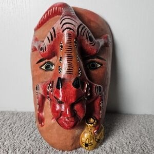 Handcrafted Folk Art Tribal Mask with Red and Black Accents